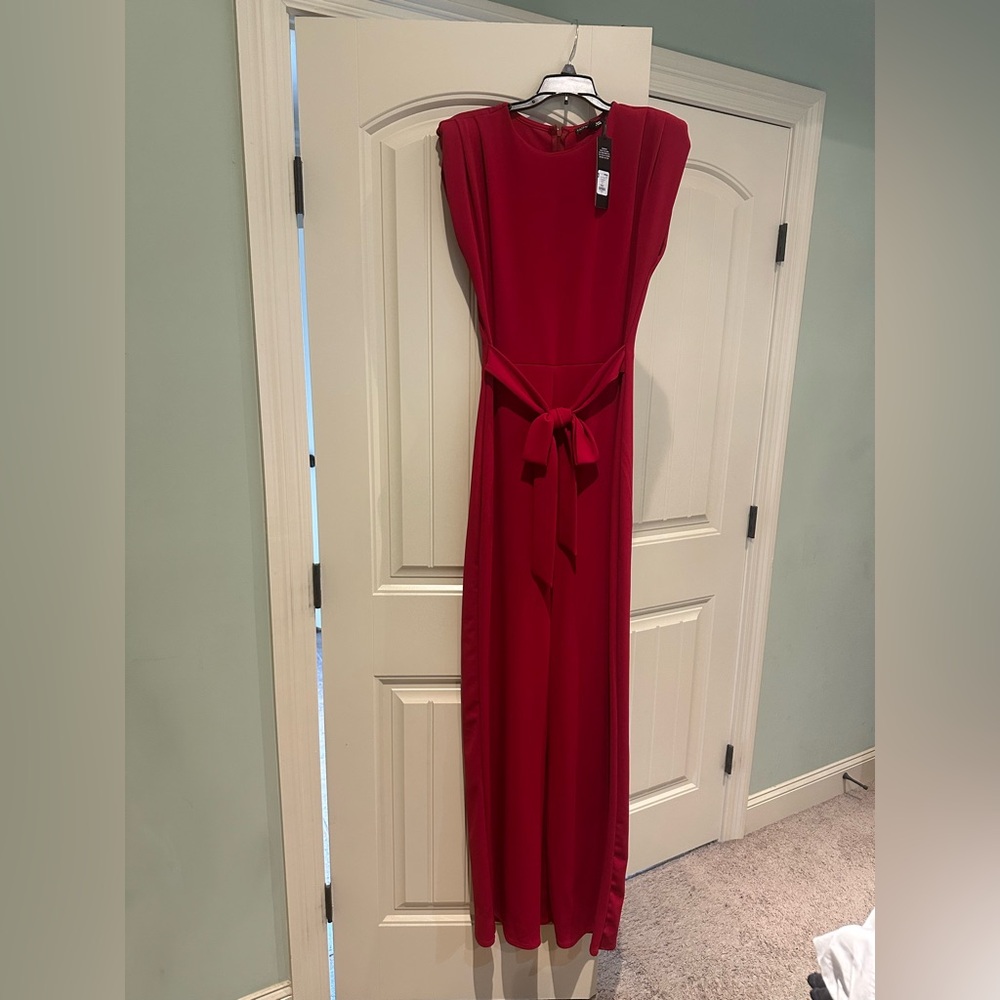 Fashion Nova red jumpsuit with belt size large. Brand new
